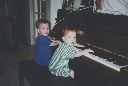 boys playing the piano