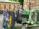 Matt with kids on a tractor