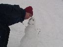 Matt kissing snowman