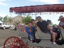 matt riding buggie with boys