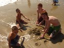 brothers having fun in the sand