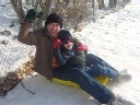 daddy and jared sledding