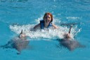 alicia swims with dolphins